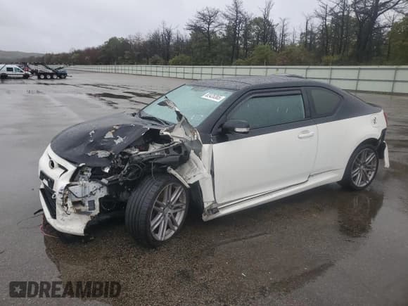 ✅ 2012 Scion tC • VIN: JTKJF5C73C3036530 • Lot: 82428365. Listed on Copart with 108,458 mi. Free auction sales archive from the USA and detailed vehicle history report at DreamBid. Image 1.