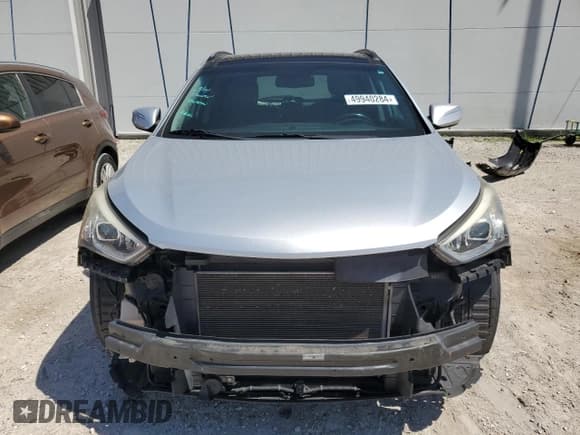 ✅ 2016 Hyundai Santa Fe • VIN: 5XYZU3LB1GG345925 • Лот: 49940284. Опубликован ранее на Copart с пробегом 66 927 миль. Бесплатный доступ к архиву аукционных продаж из США и подробный отчёт об истории автомобиля на DreamBid. Изображение 5.