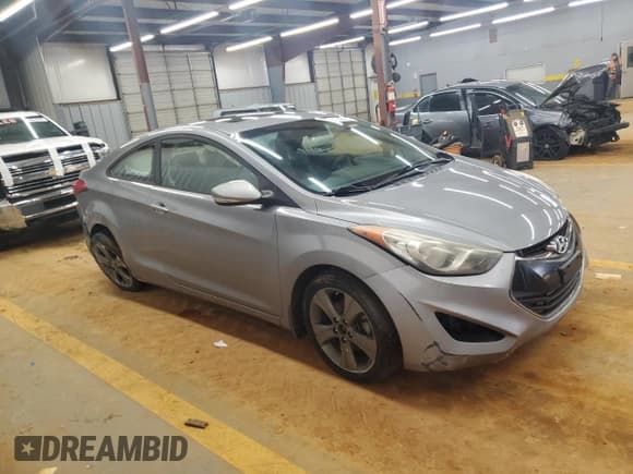 ✅ 2013 Hyundai Elantra SE • VIN: KMHDH6AE2DU011843 • Lot: 81942985. Listed on Copart with 136,492 mi. Free auction sales archive from the USA and detailed vehicle history report at DreamBid. Image 4.