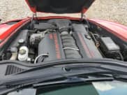 ✅ 2012 Chevrolet Corvette 1LT • VIN: 1G1YE2DW1C5103605 • Lot: 61152905. Listed on Copart with 143,458 mi. Free auction sales archive from the USA and detailed vehicle history report at DreamBid. Image 11.