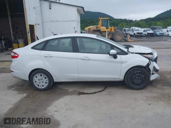✅ 2016 Ford Fiesta S • VIN: 3FADP4AJ4GM103897 • Lot: 42523789. Listed on IAAI with 166,101 mi. Free auction sales archive from the USA and detailed vehicle history report at DreamBid. Image 14.