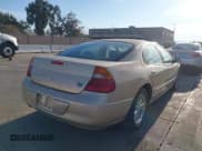 ✅ 2000 Chrysler 300M M • VIN: 2C3HE66G9YH131418 • Lot: 41037724. Listed on IAAI with 227,344 mi. Free auction sales archive from the USA and detailed vehicle history report at DreamBid. Image 3.