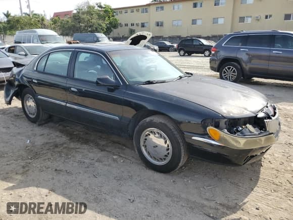 ✅ 1998 Lincoln Continental • VIN: 1LNFM97V8WY742639 • Lot: 82138303. Listed on Copart with 268,814 mi. Free auction sales archive from the USA and detailed vehicle history report at DreamBid. Image 4.