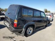 ✅ 1996 Toyota Land Cruiser • VIN: JT3HJ85J8T0140189 • Lot: 76720784. Listed on Copart with 167,649 mi. Free auction sales archive from the USA and detailed vehicle history report at DreamBid. Image 3.