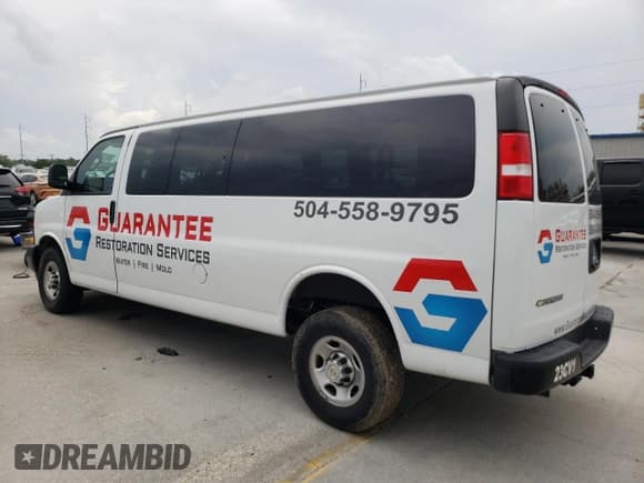 ✅ 2023 Chevrolet Express Passenger LS • VIN: 1GAZGNFP6P1205159 • Lot: 54216095. Listed on Copart with 33,752 mi. Free auction sales archive from the USA and detailed vehicle history report at DreamBid. Image 2.