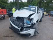 ✅ 2021 Chevrolet Colorado 2WD LT • VIN: 1GCHSCEA4M1240782 • Lot: 42989388. Listed on IAAI with 77,119 mi. Free auction sales archive from the USA and detailed vehicle history report at DreamBid. Image 2.