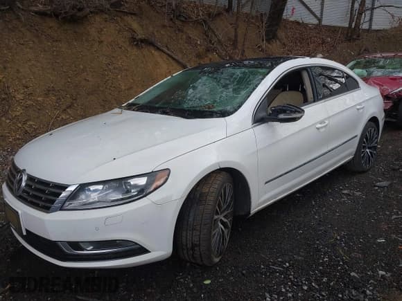 ✅ 2014 Volkswagen CC Executive • VIN: WVWGU7AN8EE535299 • Лот: 42192252. Опубликован ранее на IAAI с пробегом 62 283 миль. Бесплатный доступ к архиву аукционных продаж из США и подробный отчёт об истории автомобиля на DreamBid. Изображение 2.