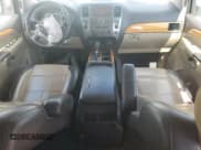 ✅ 2014 Nissan Armada Platinum • VIN: 5N1BA0NF4EN604353 • Лот: 71047995. Опубликован ранее на Copart с пробегом 211 804 миль. Бесплатный доступ к архиву аукционных продаж из США и подробный отчёт об истории автомобиля на DreamBid. Изображение 8.