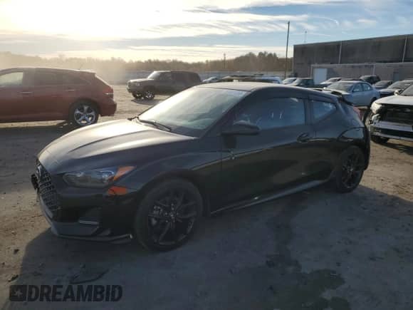 2019 Hyundai Veloster Turbo R-Spec с VIN KMHTH6AB6KU011570, выставлен на аукционе Copart как лот 79187734 с пробегом 80 933 миль миль и Списание • Salvage title. История ставок и продаж доступна на DreamBid. Изображение 1.