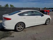 ✅ 2018 Ford Fusion SE • VIN: 3FA6P0H77JR113510 • Лот: 94438405. Опубликован ранее на Copart с пробегом 125 494 миль. Бесплатный доступ к архиву аукционных продаж из США и подробный отчёт об истории автомобиля на DreamBid. Изображение 3.