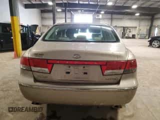 2006 Hyundai Azera SE z VIN KMHFC46F96A051743, wystawiony jako Copart lot #50220485 z przebiegiem 80 834 mil mil oraz Szkoda całkowita • Salvage title. Historia ofert i sprzedaży dostępna na DreamBid. Obrazek 6.
