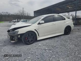 ✅ 2013 Mitsubishi Lancer Evolution GSR • VIN: JA32W8FVXDU024537 • Lot: 44785195. Wystawiony na Copart z przebiegiem 180 832 mil. Bezpłatny archiwum sprzedaży aukcyjnych z USA i szczegółowy raport historii pojazdu na DreamBid. Zdjęcie 1.