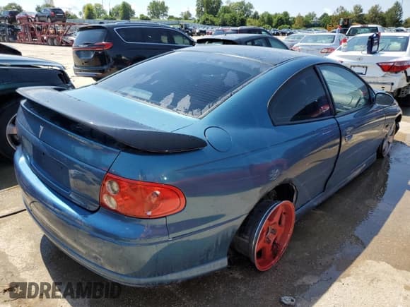 ✅ 2004 Pontiac GTO • VIN: 6G2VX12G24L282560 • Lot: 67750724. Wystawiony na Copart z przebiegiem 153 582 mil. Bezpłatny archiwum sprzedaży aukcyjnych z USA i szczegółowy raport historii pojazdu na DreamBid. Zdjęcie 3.