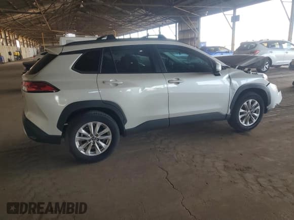 ✅ 2023 Toyota Corolla Cross LE • VIN: 7MUBAAAG8PV071516 • Lot: 87414505. Wystawiony na Copart z przebiegiem 35 598 mil. Bezpłatny archiwum sprzedaży aukcyjnych z USA i szczegółowy raport historii pojazdu na DreamBid. Zdjęcie 3.