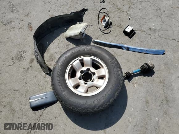 ✅ 1999 Toyota Tacoma • VIN: 4TAPM62N5XZ429571 • Lot: 80762495. Listed on Copart with 263,881 mi. Free auction sales archive from the USA and detailed vehicle history report at DreamBid. Image 12.