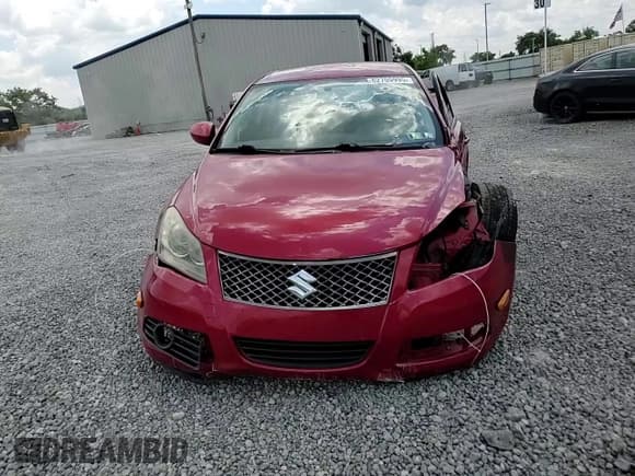 ✅ 2012 Suzuki Kizashi SE • VIN: JS2RF9A3XC6100603 • Лот: 62705995. Опубликован ранее на Copart с пробегом 186 317 миль. Бесплатный доступ к архиву аукционных продаж из США и подробный отчёт об истории автомобиля на DreamBid. Изображение 14.