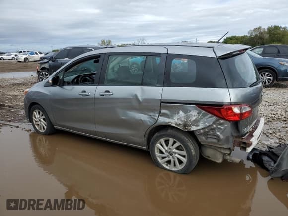 ✅ 2015 Mazda 5 Sport • VIN: JM1CW2BL5F0181474 • Lot: 82302695. Listed on Copart with 163,766 mi. Free auction sales archive from the USA and detailed vehicle history report at DreamBid. Image 2.