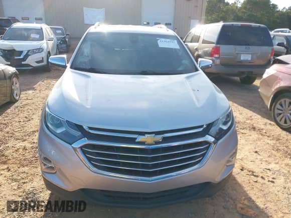2018 Chevrolet Equinox Premier z VIN 3GNAXNEX5JS509702, wystawiony jako IAAI lot #43364923 z przebiegiem 152 731 mil mil oraz . Historia ofert i sprzedaży dostępna na DreamBid. Obrazek 12.