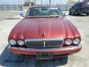 ✅ 1995 Jaguar XJ • VIN: SAJKX1744SC720830 • Lot: 69212295. Listed on Copart with 77,847 mi. Free auction sales archive from the USA and detailed vehicle history report at DreamBid. Image 5.