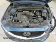 ✅ 2021 Mazda CX-5 Touring • VIN: JM3KFBCM8M1370668 • Lot: 81922665. Wystawiony na Copart z przebiegiem 86 596 mil. Bezpłatny archiwum sprzedaży aukcyjnych z USA i szczegółowy raport historii pojazdu na DreamBid. Zdjęcie 16.