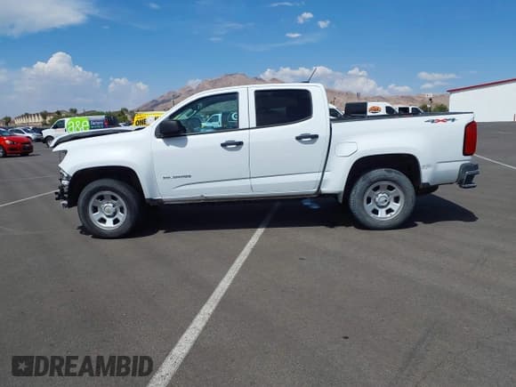 ✅ 2022 Chevrolet Colorado 4WD Work Truck • VIN: 1GCGTBEN7N1299512 • Lot: 42720023. Listed on IAAI with 41,851 mi. Free auction sales archive from the USA and detailed vehicle history report at DreamBid. Image 15.