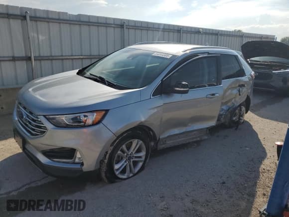 ✅ 2020 Ford Edge SEL • VIN: 2FMPK4J91LBA45914 • Lot: 84044305. Listed on Copart with 102,585 mi. Free auction sales archive from the USA and detailed vehicle history report at DreamBid. Image 1.