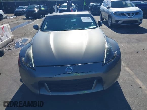 ✅ 2009 Nissan 370Z Touring • VIN: JN1AZ44E39M404491 • Lot: 43672244. Listed on IAAI with 118,427 mi. Free auction sales archive from the USA and detailed vehicle history report at DreamBid. Image 12.