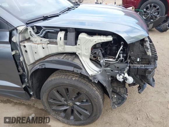 ✅ 2024 Volkswagen Taos S • VIN: 3VV5X7B28RM066154 • Лот: 43655411. Опубликован ранее на IAAI с пробегом 11 479 миль. Бесплатный доступ к архиву аукционных продаж из США и подробный отчёт об истории автомобиля на DreamBid. Изображение 6.