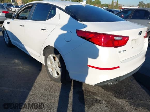 ✅ 2015 Kia Optima LX • VIN: KNAGM4A79F5589418 • Lot: 43877674. Listed on IAAI with 80,600 mi. Free auction sales archive from the USA and detailed vehicle history report at DreamBid. Image 3.