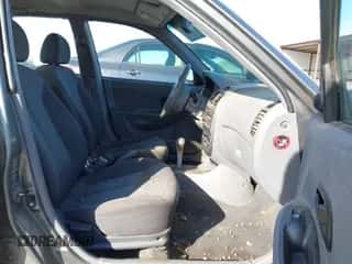 2004 Hyundai Accent GL with VIN KMHCG45C04U531177, listed as a IAAI auction lot 41526033 with 126,102 mi miles and . Bid and sale history available at DreamBid. Image 5.