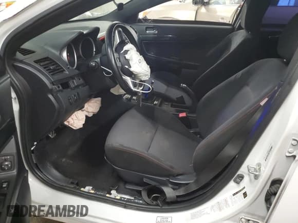 ✅ 2015 Mitsubishi Lancer Evolution Final Edition • VIN: JA32W7FV4FU028743 • Lot: 75206334. Wystawiony na Copart z przebiegiem 51 409 mil. Bezpłatny archiwum sprzedaży aukcyjnych z USA i szczegółowy raport historii pojazdu na DreamBid. Zdjęcie 7.