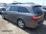 ✅ 2012 Honda Odyssey Touring • VIN: 5FNRL5H92CB116899 • Lot: 41907863. Listed on IAAI with 225,221 mi. Free auction sales archive from the USA and detailed vehicle history report at DreamBid. Image 3.