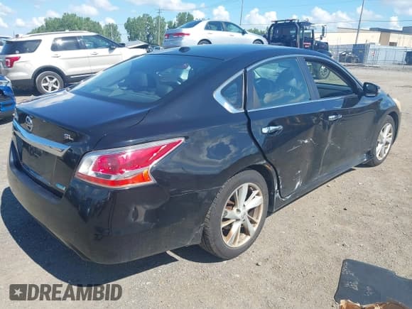 ✅ 2014 Nissan Altima SV • VIN: 1N4AL3AP2EC411212 • Lot: 43048885. Listed on IAAI with 192,348 mi. Free auction sales archive from the USA and detailed vehicle history report at DreamBid. Image 4.