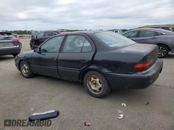 ✅ 1996 Geo Prizm • VIN: 1Y1SK5262TZ007299 • Lot: 62379425. Listed on Copart with 128,742 mi. Free auction sales archive from the USA and detailed vehicle history report at DreamBid. Image 2.