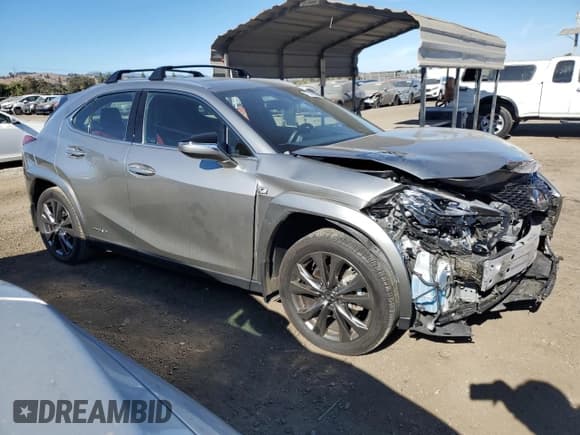 ✅ 2022 Lexus UX 250h F Sport • VIN: JTHE9JBH2N2062143 • Лот: 77345634. Опубликован ранее на Copart с пробегом 13 118 миль. Бесплатный доступ к архиву аукционных продаж из США и подробный отчёт об истории автомобиля на DreamBid. Изображение 4.