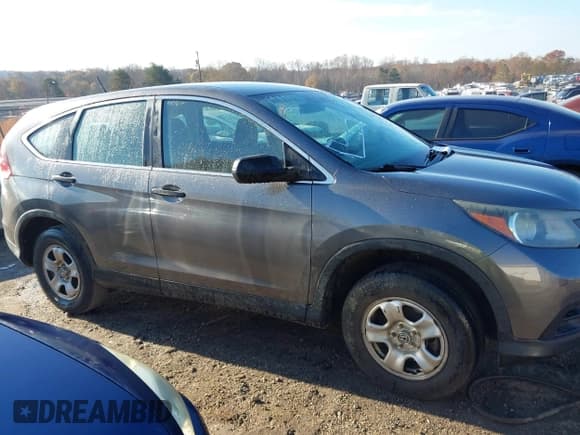 ✅ 2013 Honda CR-V LX • VIN: 2HKRM3H38DH521102 • Lot: 43713312. Listed on IAAI with 184,708 mi. Free auction sales archive from the USA and detailed vehicle history report at DreamBid. Image 14.