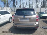 ✅ 2016 Subaru Forester Touring • VIN: JF2SJAVC1GH404811 • Lot: 42093338. Listed on IAAI with 44,635 mi. Free auction sales archive from the USA and detailed vehicle history report at DreamBid. Image 16.