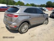 ✅ 2019 Lincoln MKC Standard • VIN: 5LMCJ1C90KUL46144 • Lot: 81379075. Listed on Copart with 94,004 mi. Free auction sales archive from the USA and detailed vehicle history report at DreamBid. Image 3.