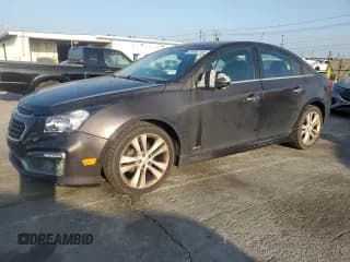 ✅ 2015 Chevrolet Cruze LTZ • VIN: 1G1PG5SB7F7110302 • Lot: 90692165. Listed on Copart with 117,016 mi. Free auction sales archive from the USA and detailed vehicle history report at DreamBid. Image 1.