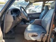 ✅ 1996 Toyota Land Cruiser • VIN: JT3HJ85J8T0140189 • Lot: 76720784. Listed on Copart with 167,649 mi. Free auction sales archive from the USA and detailed vehicle history report at DreamBid. Image 7.