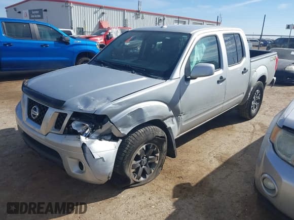 ✅ 2018 Nissan Frontier SV • VIN: 1N6AD0EV0JN761092 • Lot: 41502701. Listed on IAAI with 103,900 mi. Free auction sales archive from the USA and detailed vehicle history report at DreamBid. Image 2.