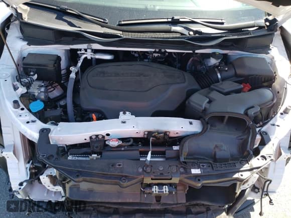 ✅ 2024 Honda Odyssey Touring • VIN: 5FNRL6H85RB045705 • Lot: 69996305. Listed on Copart with 10,332 mi. Free auction sales archive from the USA and detailed vehicle history report at DreamBid. Image 12.