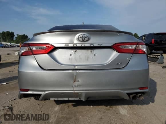 2019 Toyota Camry LE z VIN 4T1B11HK6KU210594, wystawiony jako Copart lot #66894775 z przebiegiem Nie podano mil oraz Szkoda całkowita • Salvage title. Historia ofert i sprzedaży dostępna na DreamBid. Obrazek 6.