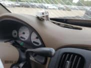 ✅ 2001 Chrysler Voyager LX • VIN: 1C4GJ45331B153080 • Lot: 53821365. Wystawiony na Copart z przebiegiem Nie podano. Bezpłatny archiwum sprzedaży aukcyjnych z USA i szczegółowy raport historii pojazdu na DreamBid. Zdjęcie 9.