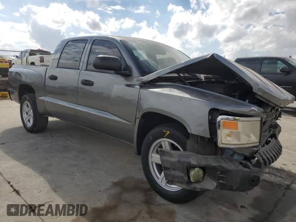 2008 Dodge Dakota SLT with VIN 1D7HE48N58S578824, listed as a Copart auction lot 78477474 with 64,557 mi miles and Salvage title. Bid and sale history available at DreamBid. Image 4.