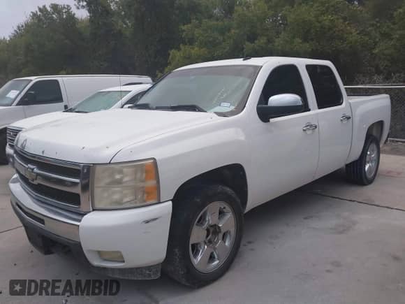 2010 Chevrolet Silverado 1500 LT with VIN 3GCRCSE03AG127857, listed as a IAAI auction lot 43555040 with 252,652 mi miles and . Bid and sale history available at DreamBid. Image 2.