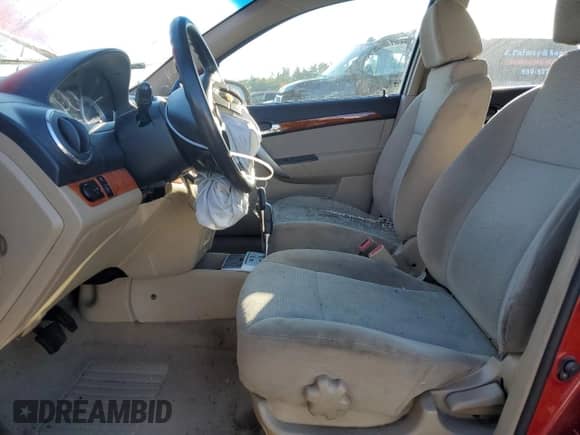 2011 Chevrolet Aveo 2LT z VIN KL1TG5DE4BB148291, wystawiony jako Copart lot #74798454 z przebiegiem Nie podano mil oraz Szkoda całkowita • Salvage title. Historia ofert i sprzedaży dostępna na DreamBid. Obrazek 7.