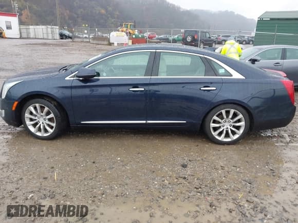 ✅ 2017 Cadillac XTS Luxury • VIN: 2G61M5S3XH9117554 • Lot: 43765590. Listed on IAAI with 153,045 mi. Free auction sales archive from the USA and detailed vehicle history report at DreamBid. Image 14.