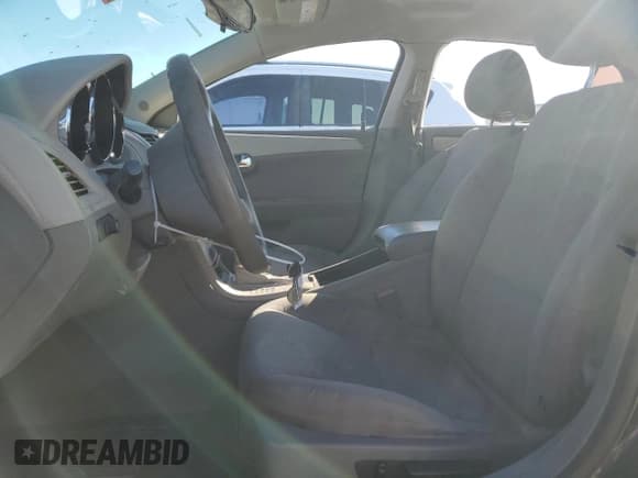 ✅ 2012 Chevrolet Malibu 1LS • VIN: 1G1ZB5E08CF268988 • Lot: 81376964. Listed on Copart with 147,210 mi. Free auction sales archive from the USA and detailed vehicle history report at DreamBid. Image 7.