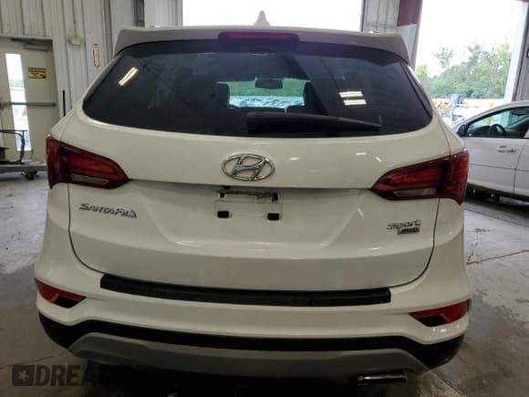 ✅ 2017 Hyundai Santa Fe 2.4L • VIN: 5NMZUDLB9HH024793 • Лот: 59404644. Опубликован ранее на Copart с пробегом 68 215 миль. Бесплатный доступ к архиву аукционных продаж из США и подробный отчёт об истории автомобиля на DreamBid. Изображение 6.